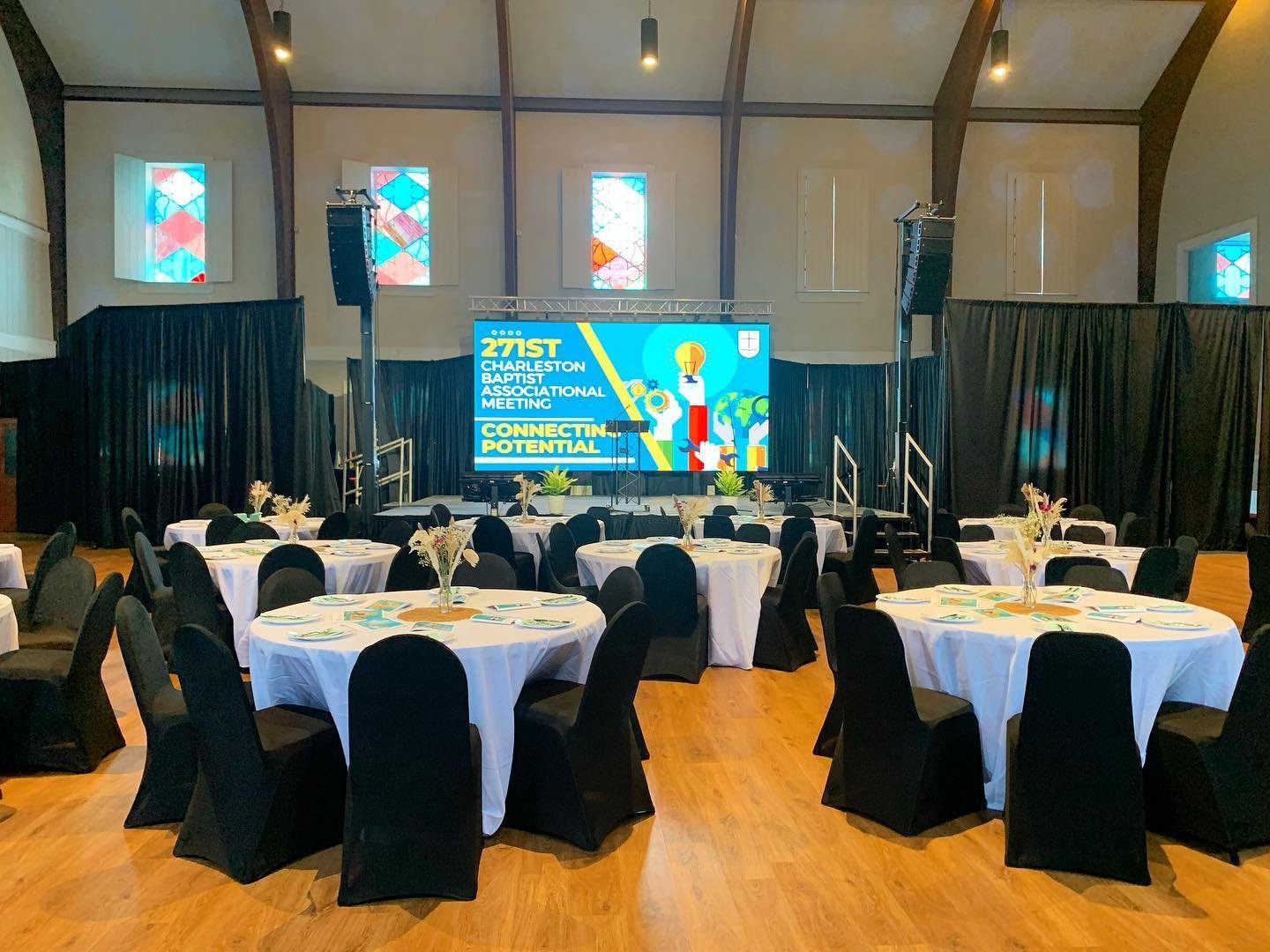 The Gathering Center set with round tables for a citywide event